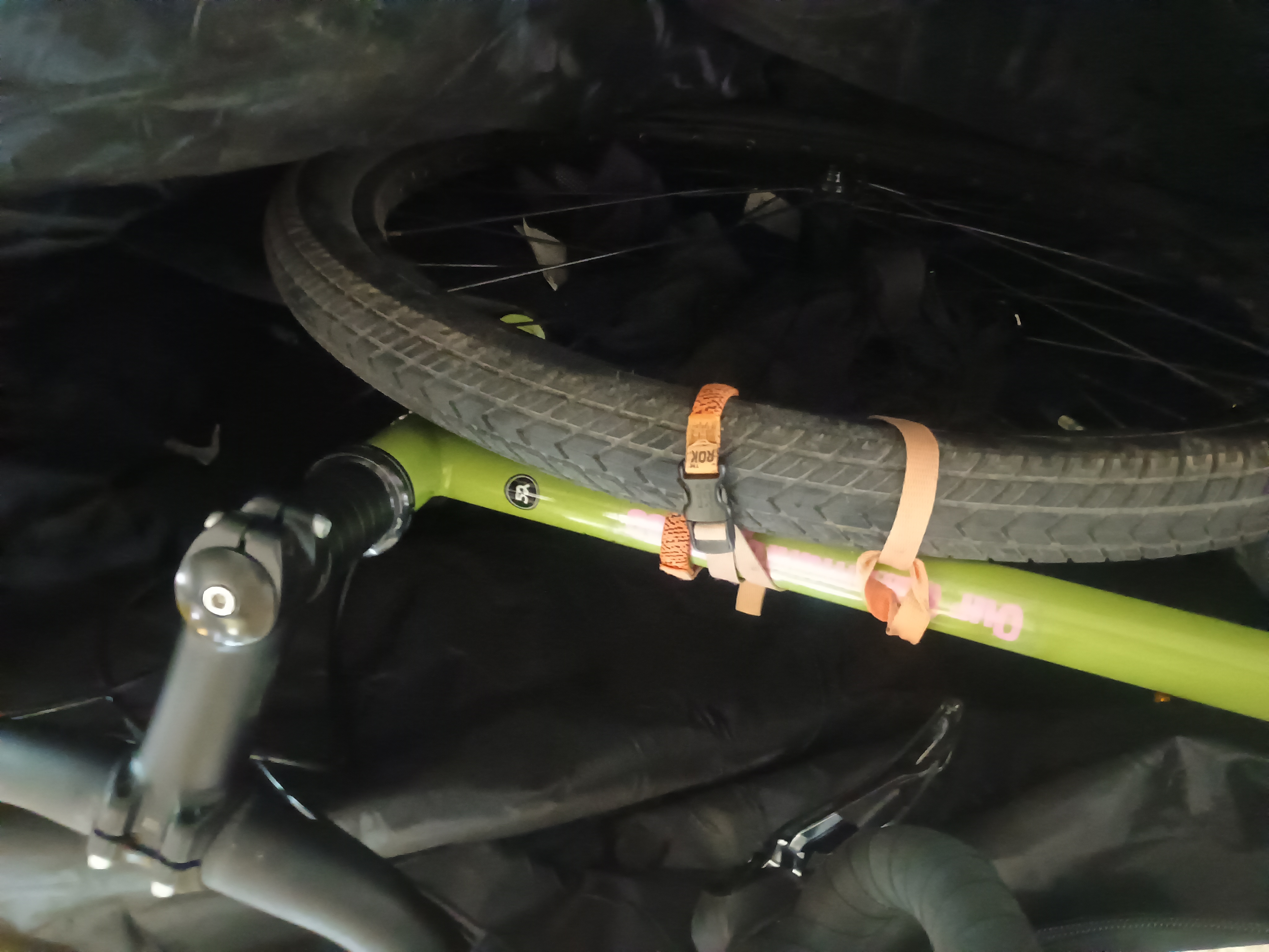 Bungee cord securing the wheel to the frame